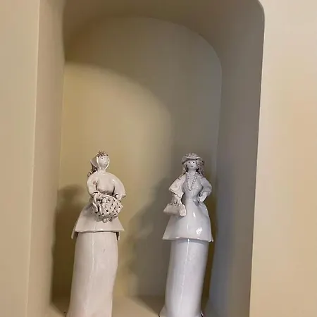 Ai Cortili *